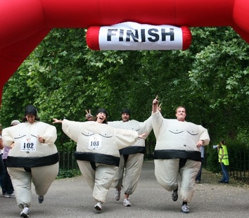 Sumo Run participants crossing the finish line