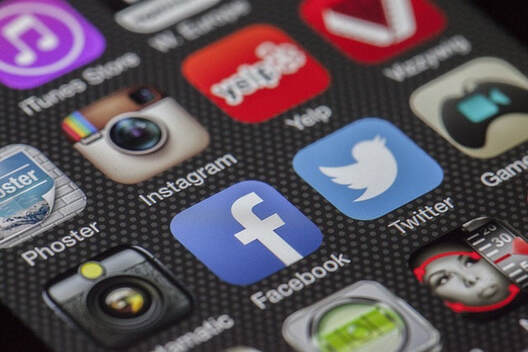 Close-up photo of social media icons on a smartphone