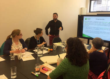 Mike delivering a fundraising strategy workshop for a group of participants in Bristol