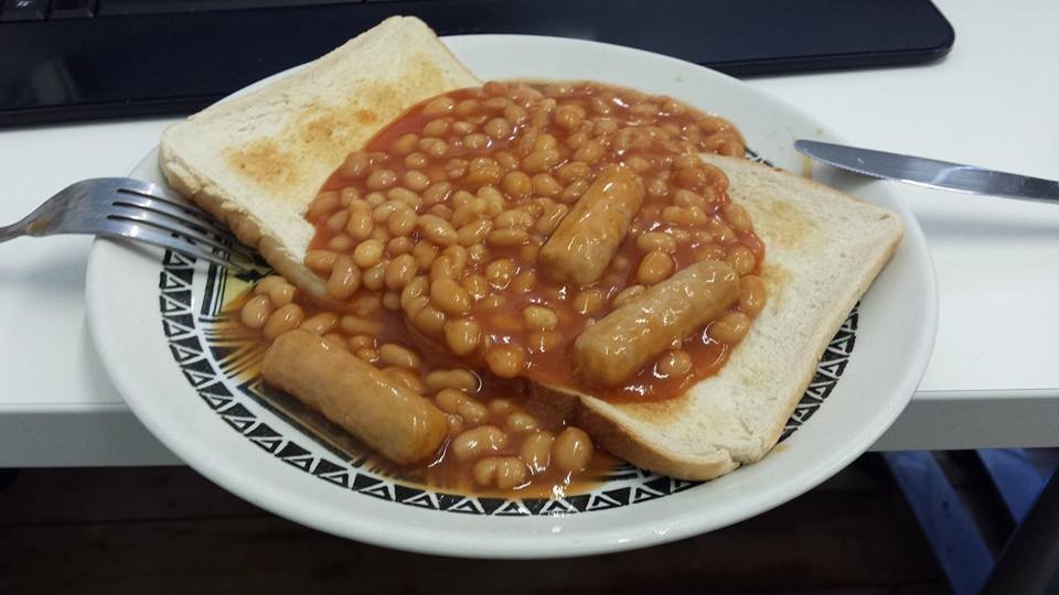 Treat day mini sausages baked beans on toast